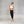 Load image into Gallery viewer, a women wearing a white sports bra and black harem yoga pants