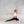 Load image into Gallery viewer, a women performing a yoga pose wearing a white sports bra and black harem yoga pants
