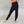 Load image into Gallery viewer, a women wearing black harem yoga pants
